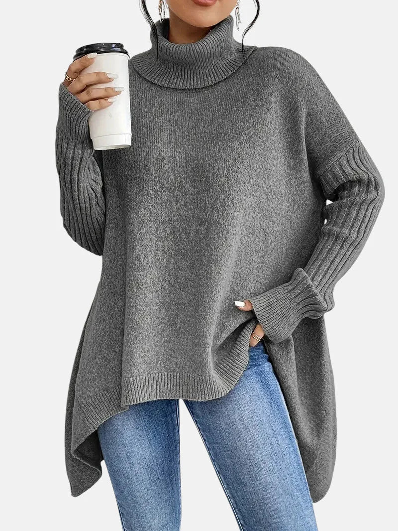 Delia Asymmetric Hem Turtleneck Sweater in Grey
