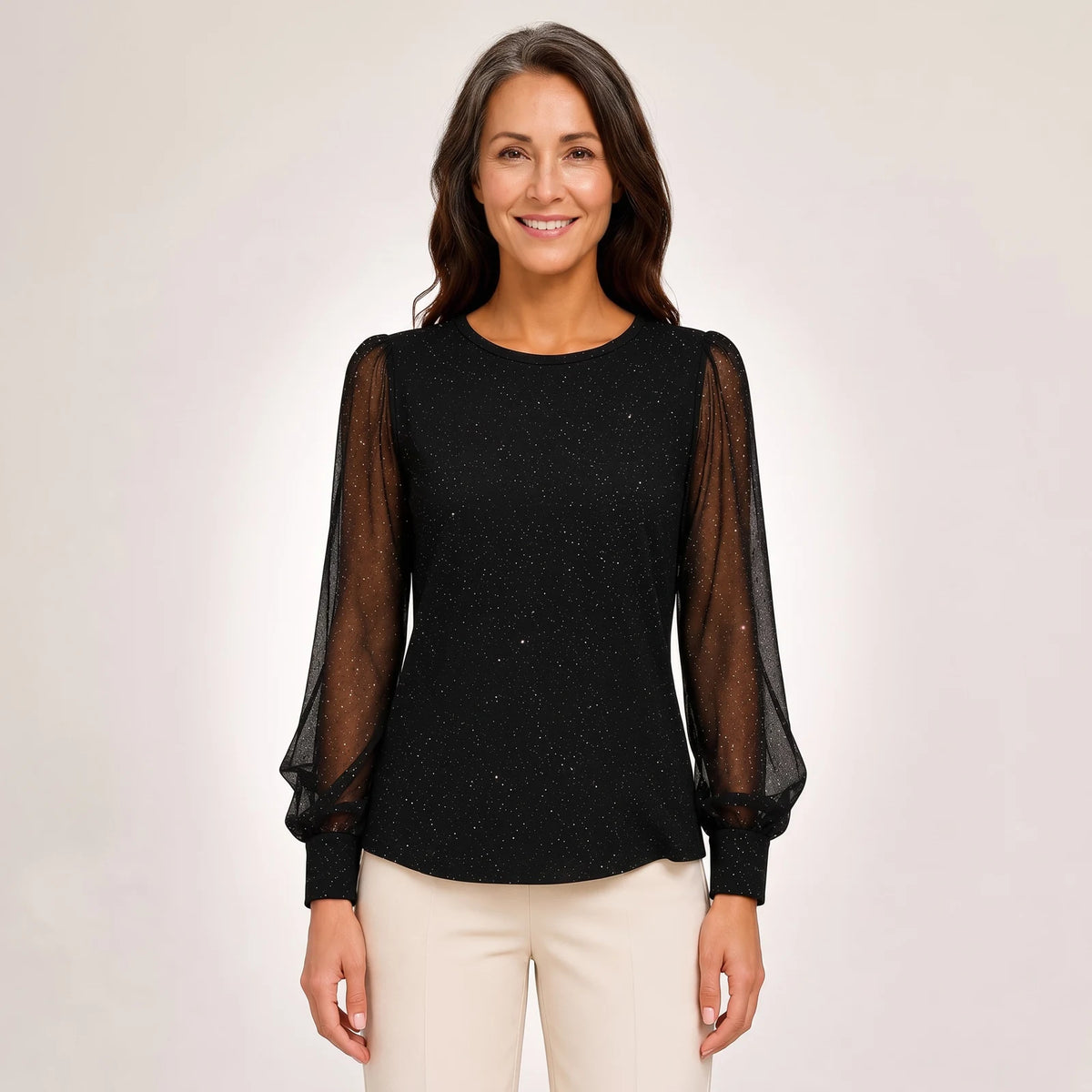 Francine Shimmer Blouse with Sheer Sleeves in Black, worn