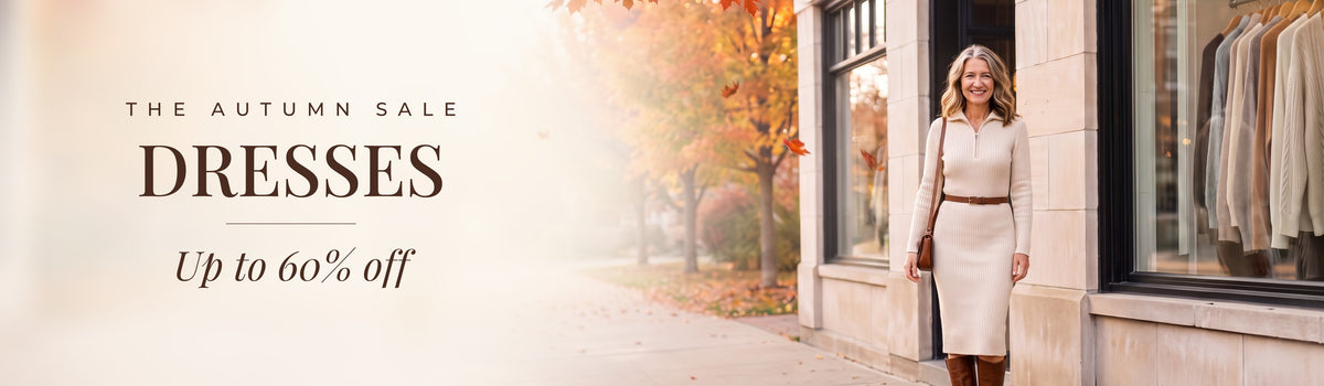 The Autumn Sale: Dresses, up to 60% off. Mae in front of the Linden & Mae boutique.